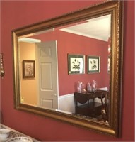 BEVELED MIRROR IN GOLD COLORED FRAME