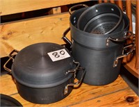 Calphalon pots, one with lid that doubles as a pan