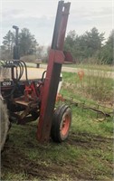 Side mounted hydraulic post pounder