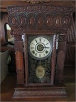 Old clock with "cameo" pendulum