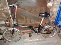 Dahon 6 Speed Folding Bicycle in Basement