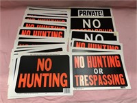 Lot of No hunting trespassing and hunting signs