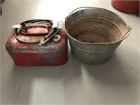 Vintage boat motor gas tank and bucket