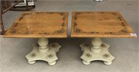 A pair of stenciled top tables