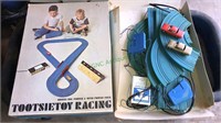 Tootsie toy Racing car sit with the track, two