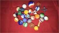 Group of 24 vintage marbles including one large