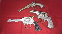 Three vintage toy cap guns, trooper, cowpoke
