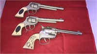 Three toy cap gun’s, pair of wagontrain with