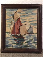 Antique framed needlepoint of sailboats.

 9” x