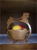 Wooden rooster with fruit