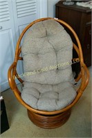Papasan style swivel chair