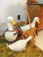 3 ceramic ducks and wooden wagon