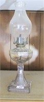 Glass oil lamp with chimney