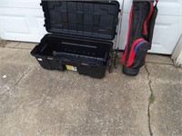 Storage container; 2 fishing poles; golf clubs