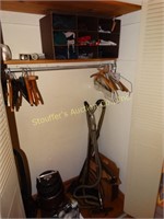 Hall closet contents - vacuums, gloves, hats,