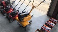 Unused Front Tine Rototiller with gas engine