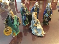 Group of 4 Chinese Mudmen Figurines