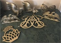 GROUP OF BRASS TRIVETS AND DECOR