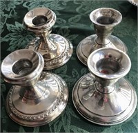 (4) WEIGHTED STERLING CANDLEHOLDERS