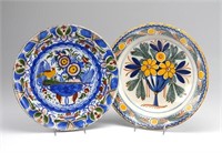 TWO DUTCH DELFT POTTERY FLORAL CHARGERS