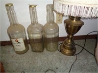 3 Large Liquor Bottles, Lamp and BP Cuffs