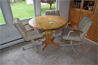 Drop leaf kitchenette with 3 rolling chairs, 40