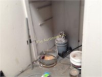 Paints solvents buckets contents under stairwell
