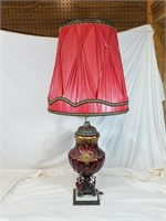 Beautiful vintage red lamp with marble bottom