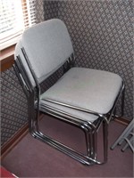 4 Grey Cloth w / metal frame Stackable Chairs