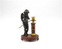 BRONZE AND MARBLE FIGURAL CANDLESTICK