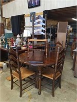 Table with 4 Ladder back chairs and a leaf