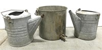 Two galvanized watering cans & spouted steel pot