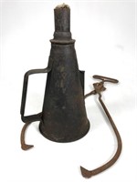 Antique railroad torch and ice tongs