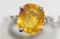 $7500. 10K Yellow Sapphire Diamond Ring