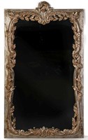 AN ORNATE CONTEMPORARY GILDED MIRROR