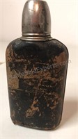 Mid century glass flask with leather cover from