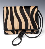 A CARLOS FALCHI PONY HAIR CLUTCH PURSE