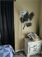Floor Lamp And Items On Wall