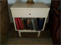White cabinet with books