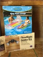 Inflatable lounge, flood light holders, bug zapper