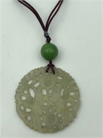 Carved jade pendant necklace