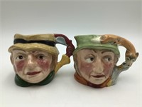Lot of two Staffordshire character jugs