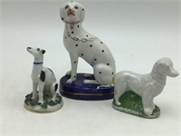 Three Porcelain Dog figurines