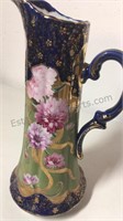 Large ceramic hand painted floral pitcher