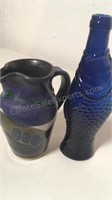Prairie Fire Pottery stone pitcher and blue glass
