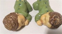 Ceramic sleeping twin boy figurines