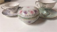 2 footed porcelain teacup & saucer