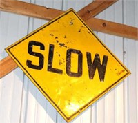 YELLOW SLOW SIGN