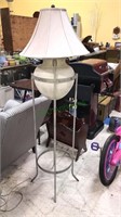 Iron and pottery floor lamp with shade, 61 inches