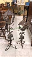 Two decorative outdoor metal candle stands, 39